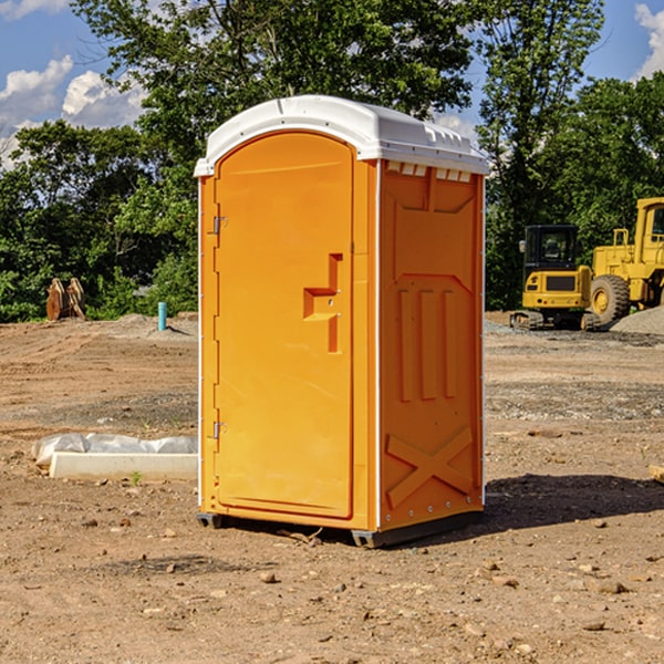 what is the cost difference between standard and deluxe portable restroom rentals in Poplar Grove